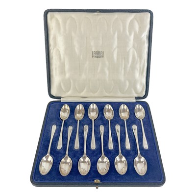 Lot 65 - A cased set of twelve silver coffee spoons by Harrods Ltd.