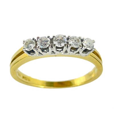 Lot 104 - An 18ct diamond set five stone ring.