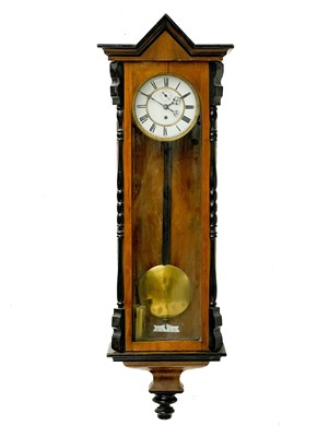 Lot 331 - A Vienna regulator type walnut wall clock.