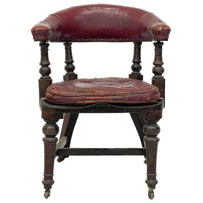 Lot 702 - A Victorian walnut bow back desk or armchair.