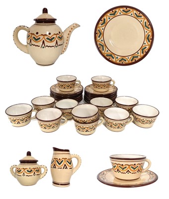 Lot 569 - A Quimper pottery tea set.