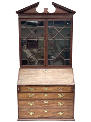 Lot 623 - A George III mahogany bureau bookcase.