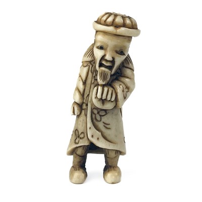 Lot 348 - A Japanese carved bone netsuke modelled as a sage.