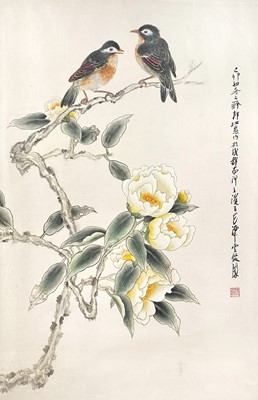 Lot 1258 - A Chinese watercolour depicting birds on a blossoming branch.