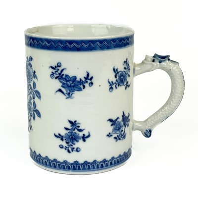 Lot 1264 - A Chinese blue and white porcelain tankard, 18th century.