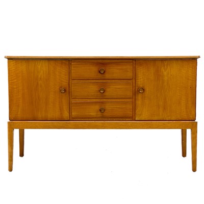 Lot 701 - A Gordon Russell Broadway walnut veneer sideboard.