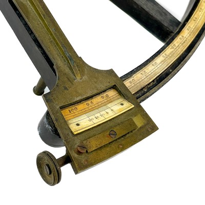 Lot 37 - A brass and ebony octant.