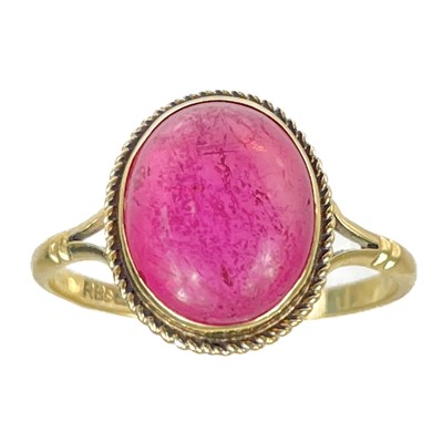 Lot 120 - A modern 9ct gold rubellite tourmaline cabochon set ring.