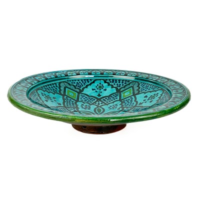 Lot 114 - A large Moroccan pottery shallow bowl.