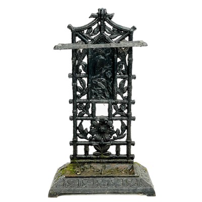 Lot 56 - A Victorian Aesthetic movement cast iron stick stand.