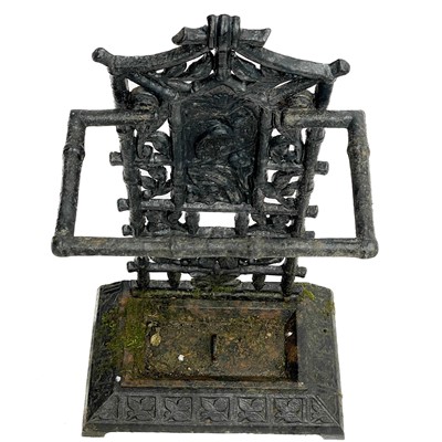 Lot 56 - A Victorian Aesthetic movement cast iron stick stand.