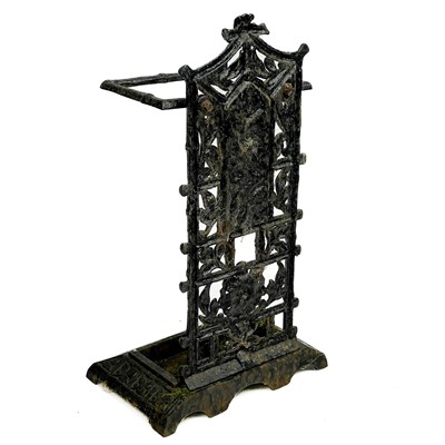 Lot 56 - A Victorian Aesthetic movement cast iron stick stand.