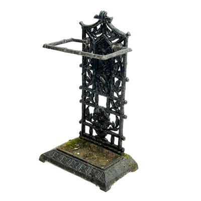 Lot 56 - A Victorian Aesthetic movement cast iron stick stand.