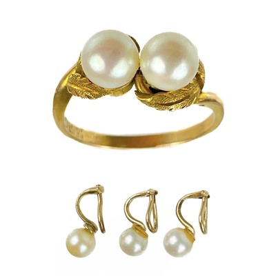 Lot 135 - A 14ct gold pearl set ring and three 9ct gold mounted clip earrings.