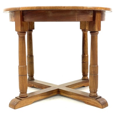 Lot 694 - A Robin Nance circular walnut occasional table.