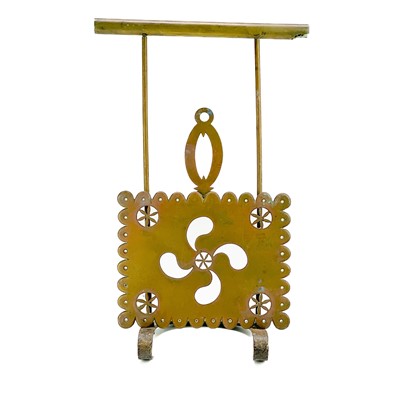 Lot 204 - A Victorian brass sliding trivet.