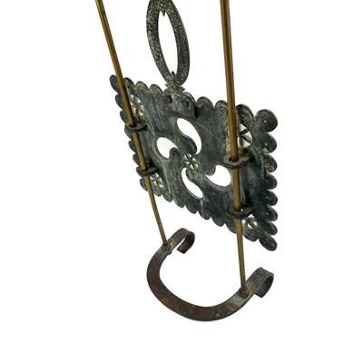 Lot 204 - A Victorian brass sliding trivet.