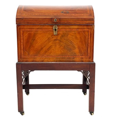 Lot 739 - A late George III mahogany cellarette on a stand.