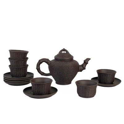 Lot 277 - A Chinese Yixing pottery tea service, 20th century.