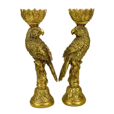 Lot 215 - A pair of gold painted candle stick holders modelled as parrots.