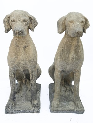 Lot 365 - A pair of reconstituted stone Labradors.