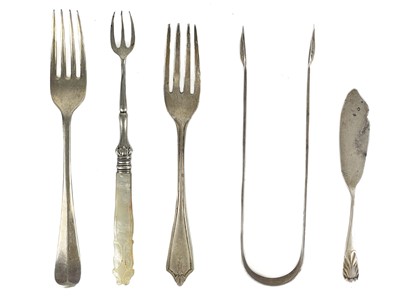 Lot 69 - Three silver forks and a pair of silver sugar tongs.