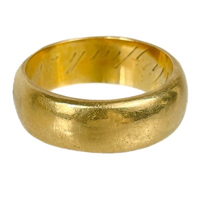 Lot 176 - A 19th century high purity heavy gold (tests 18ct) band ring.