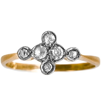 Lot 180 - An early 20th century 18ct diamond set six stone ring.