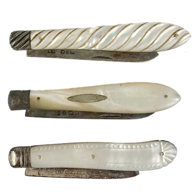 Lot 74 - Three silver pocket knives with mother of pearl handles.