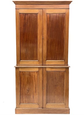 Lot 643 - A Victorian mahogany two-part estate cupboard.