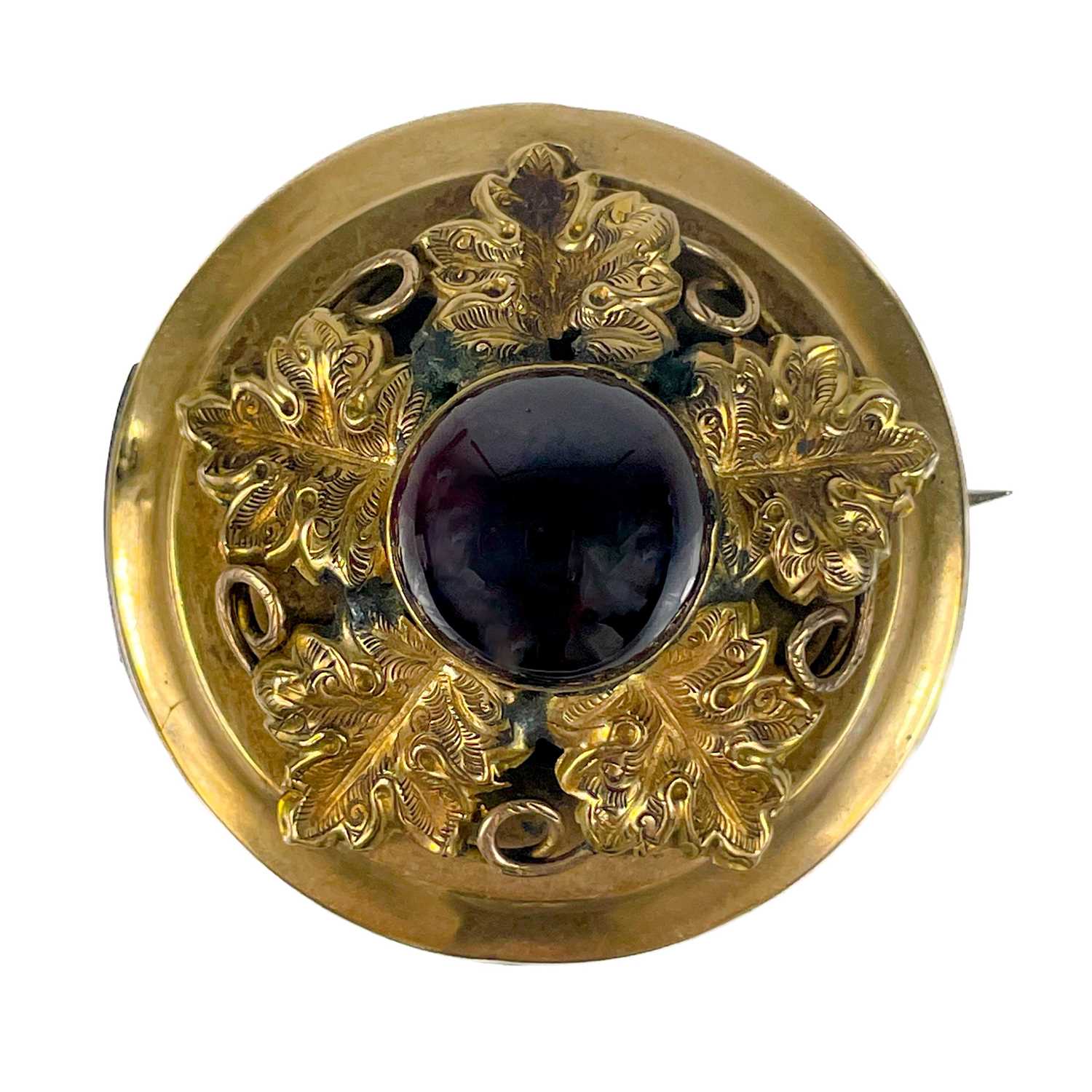 Lot 185 - A Victorian gold (tests 9ct) garnet set