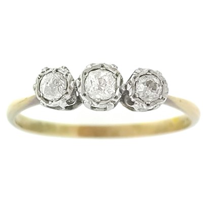 Lot 187 - An 18ct and platinum diamond set three stone ring.