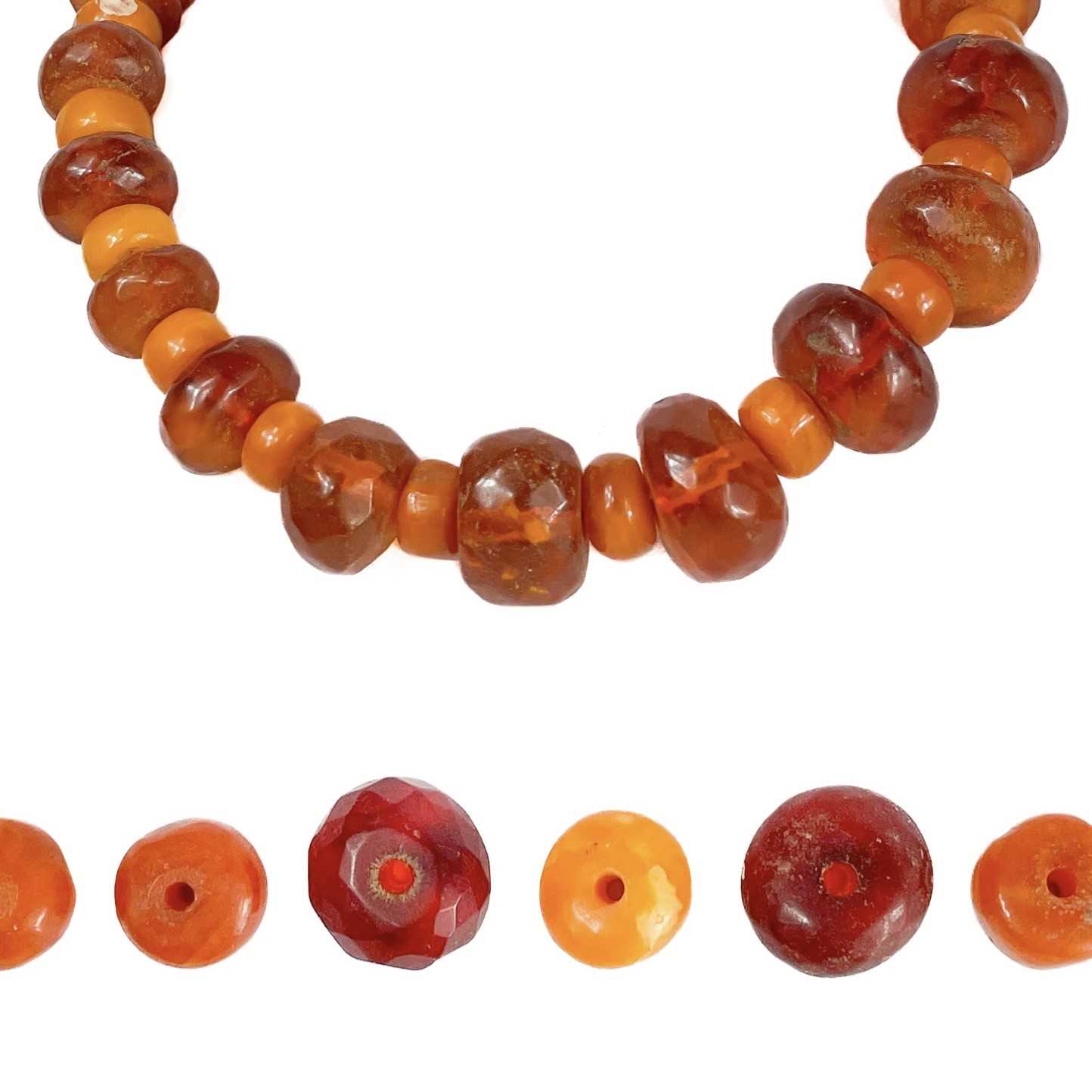 Lot 269 An amber bead necklace.