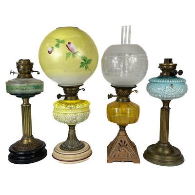 Lot 63 - Four Victorian oil lamps.