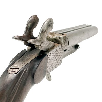 Lot 285 - A Continental pin fire double barrel pistol.