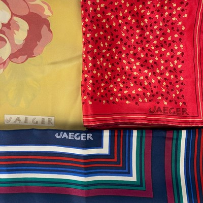 Lot 620 - Jaeger - seven various printed silk scarves.