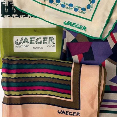 Lot 620 - Jaeger - seven various printed silk scarves.