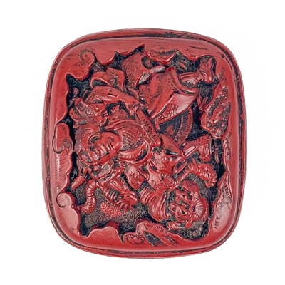 Lot 1088 - A Japanese cinnabar lacquer netsuke.