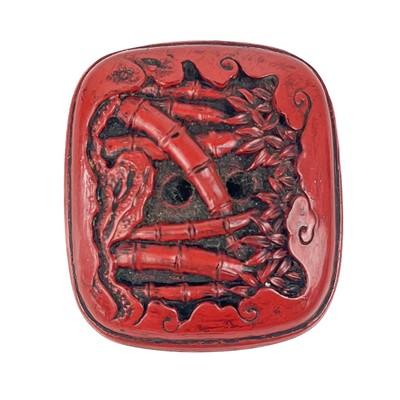 Lot 1088 - A Japanese cinnabar lacquer netsuke.