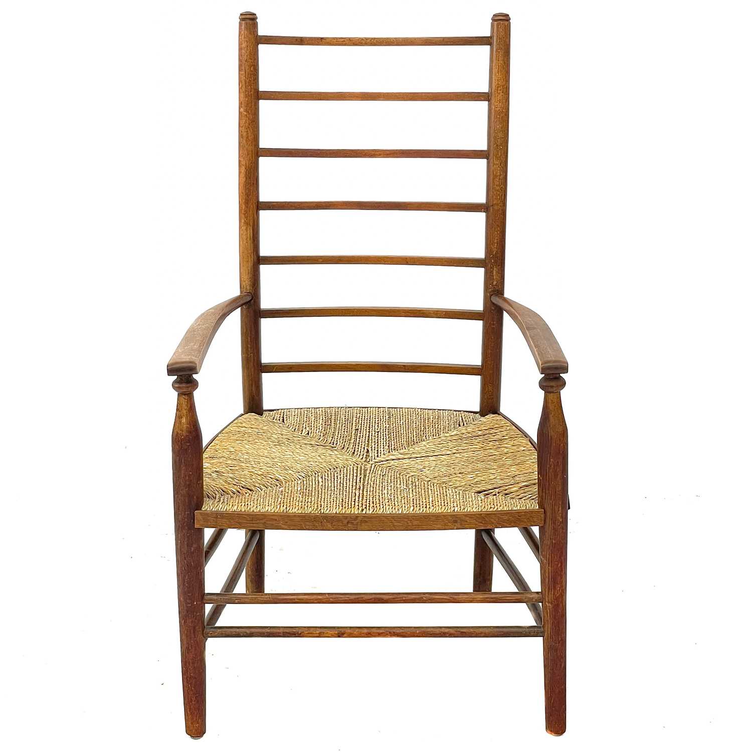 Lot 647 - A beech ladderback nursing chair labelled Liberty.