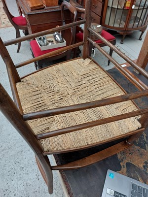 Lot 647 - A beech ladderback nursing chair labelled Liberty.