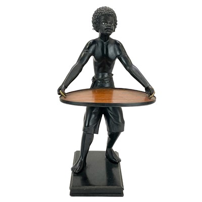 Lot 125 - A carved ebony table waiter.