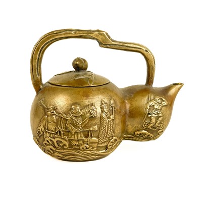 Lot 359 - A Chinese bronze teapot, in the form of a gourd.