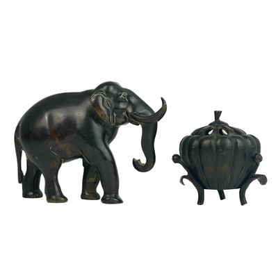 Lot 366 - A Japanese bronze model of an elephant, signed.