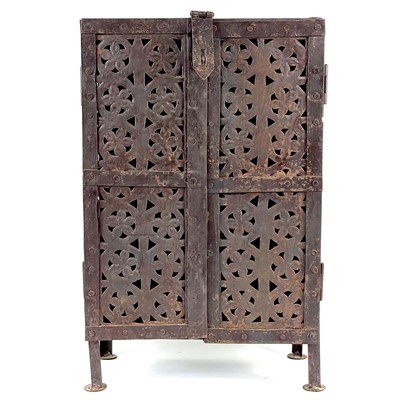 Lot 136 - An Islamic pierced iron cabinet.