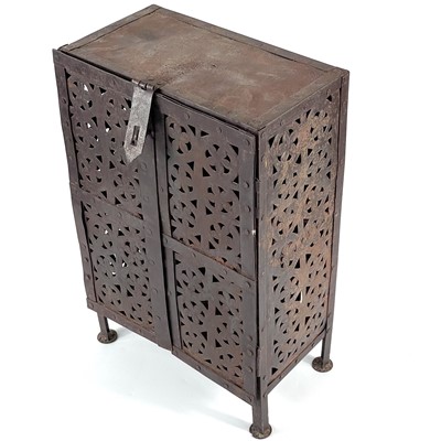 Lot 136 - An Islamic pierced iron cabinet.