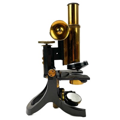 Lot 149 - A Swift & Son brass and lacquered microscope.