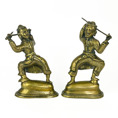 Lot 375 - A Pair of Tibetan polished bronze warriors, 19th century.