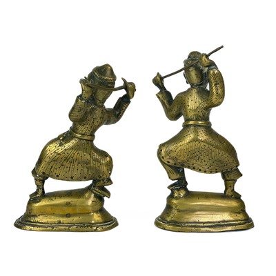 Lot 375 - A Pair of Tibetan polished bronze warriors, 19th century.