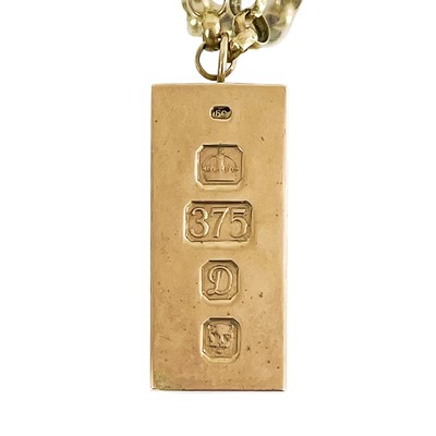 Lot 94A - A heavy 9ct hallmarked ingot pendant on a 9ct belcher link chain.